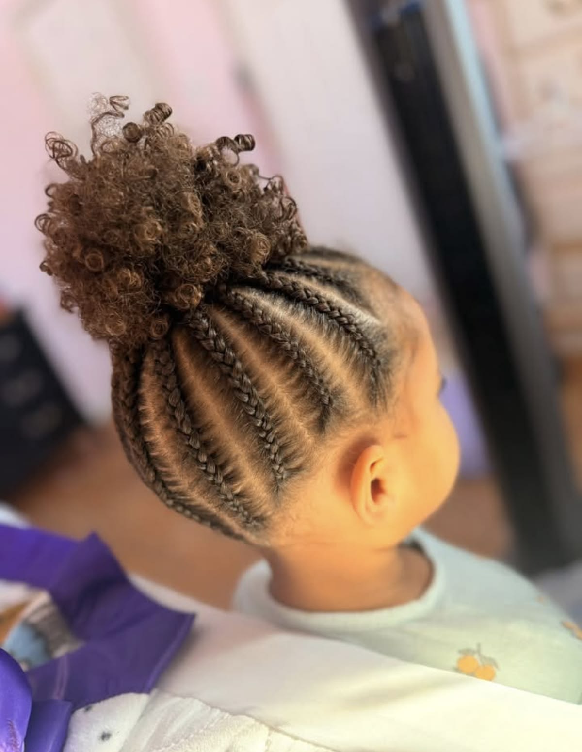 Cornrows Into a Curly Puff