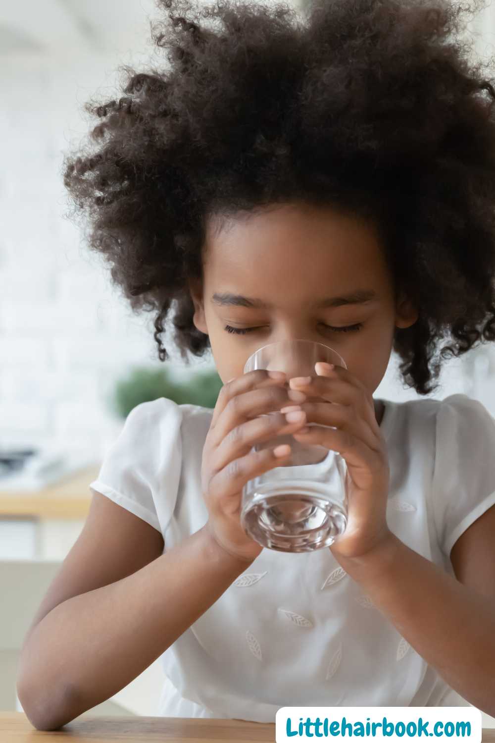 little girl drinking water